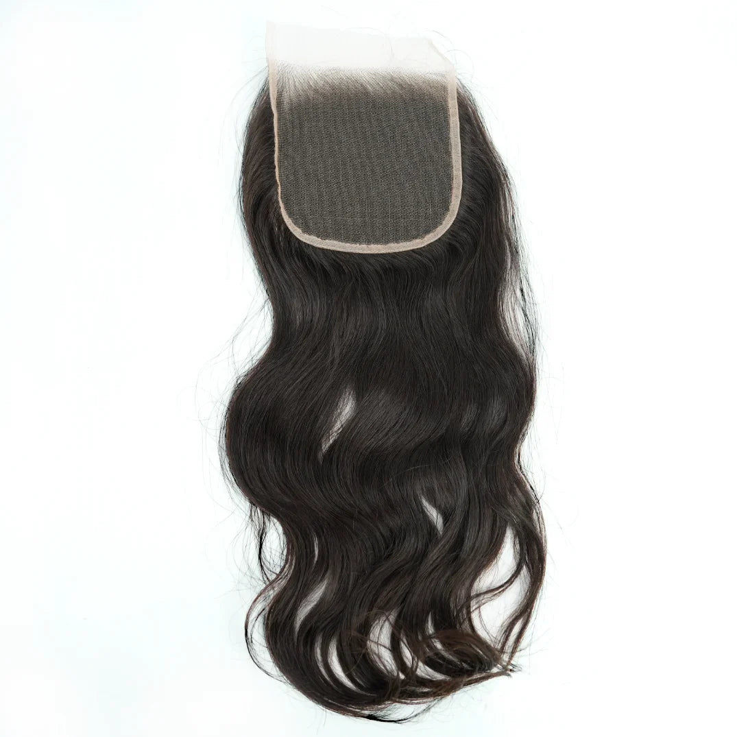 Black wavy hair closure on a white background